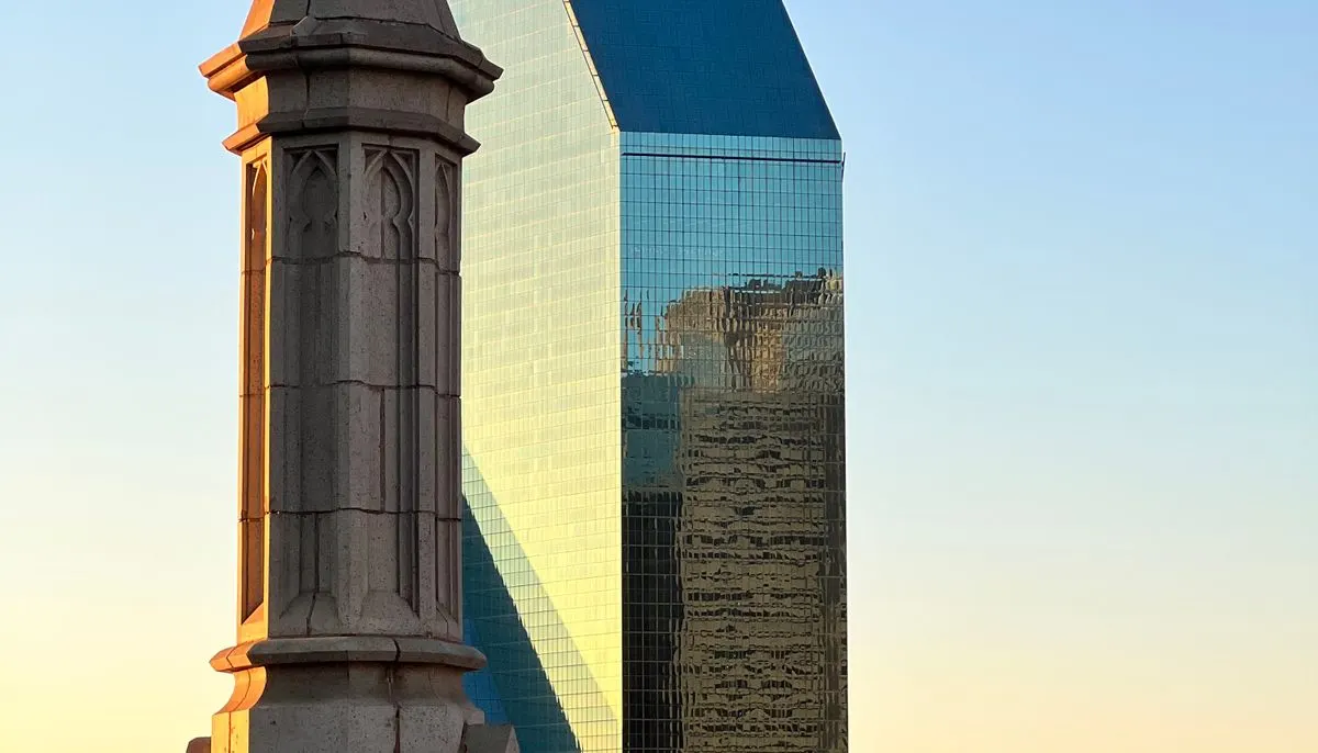 Modern glass building under blue sky