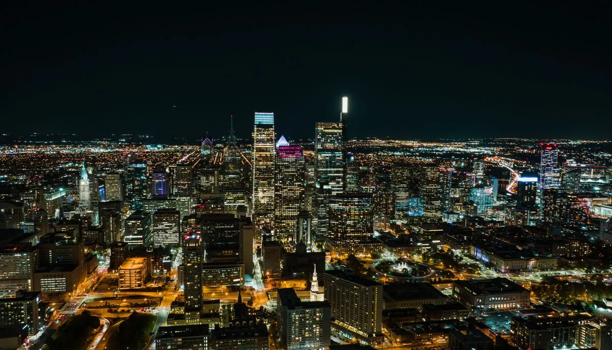 Aerial view of an illuminated modern downtown at night