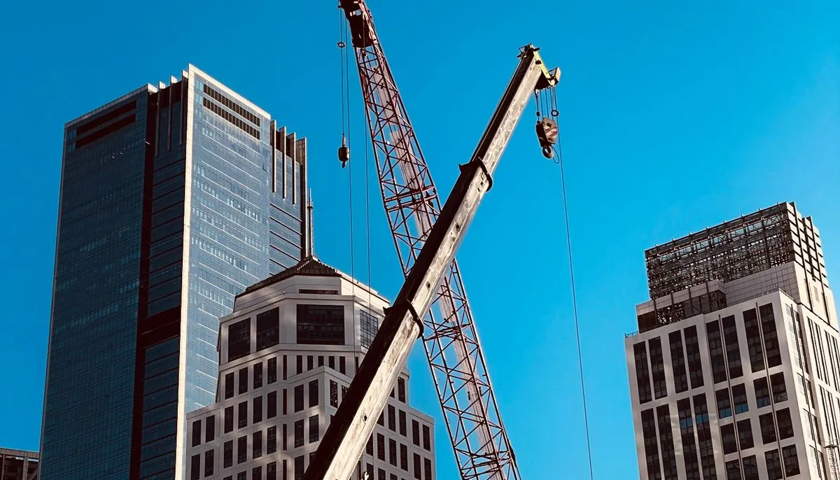 A crane near city buildings