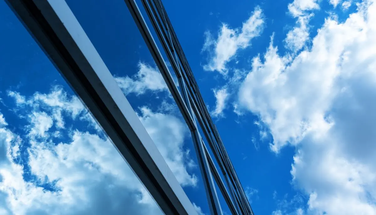 Low angle photography of high rise building under blue sky