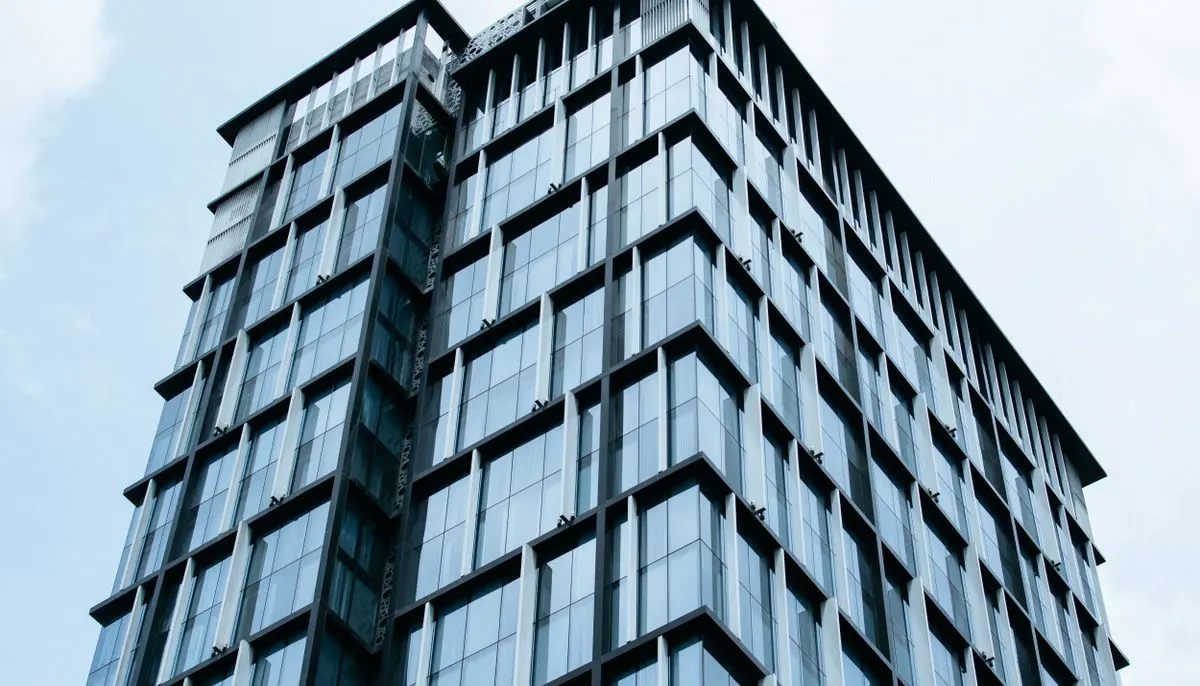 Curtain glass building under blue sky