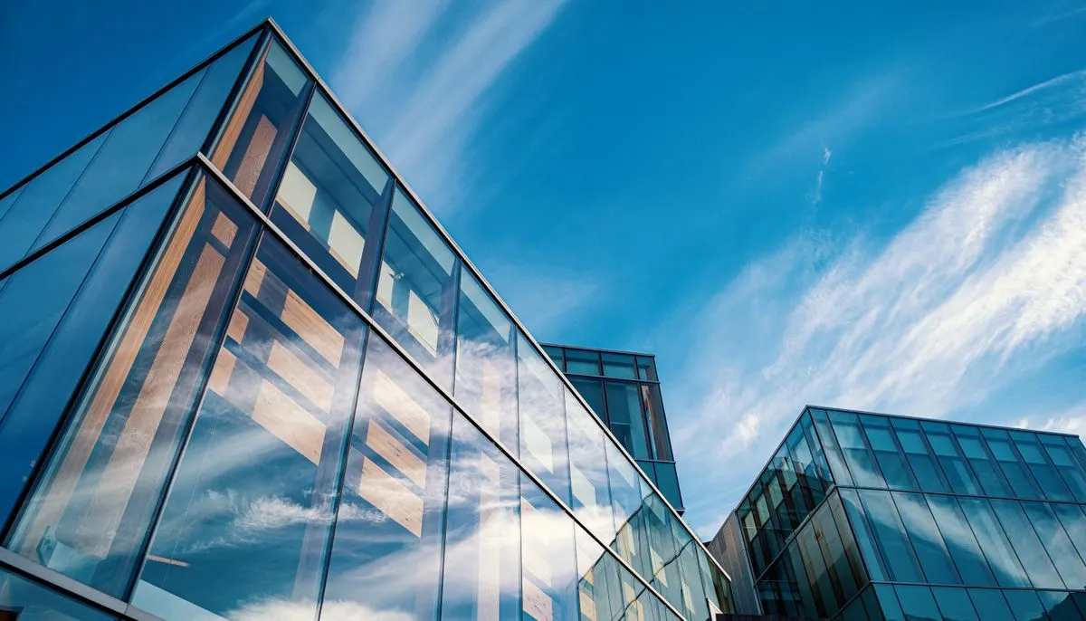 Low angle photo of glass buildings