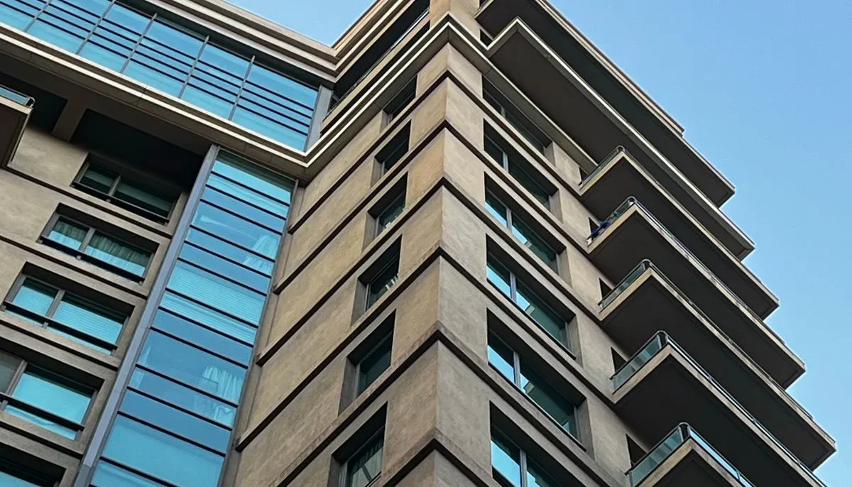 Modern high rise building against blue sky