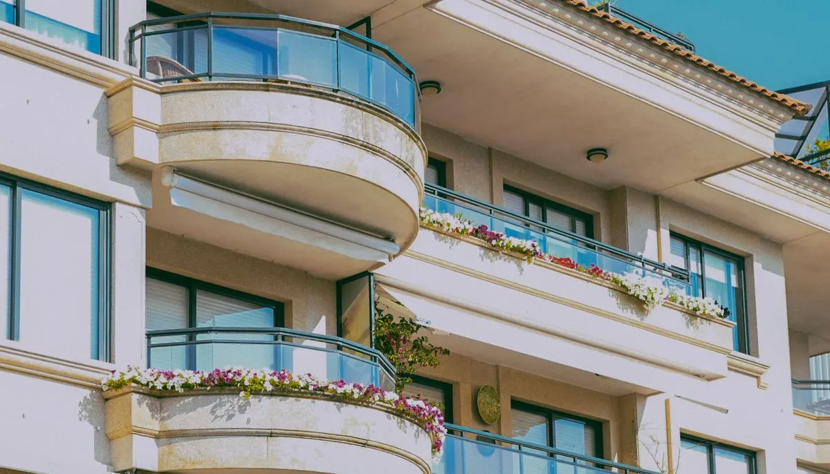 Modern apartment building with glass balconies