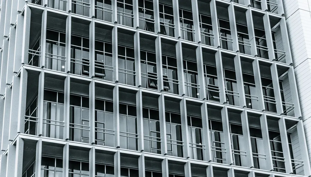 Modern highrise building facade with grid pattern