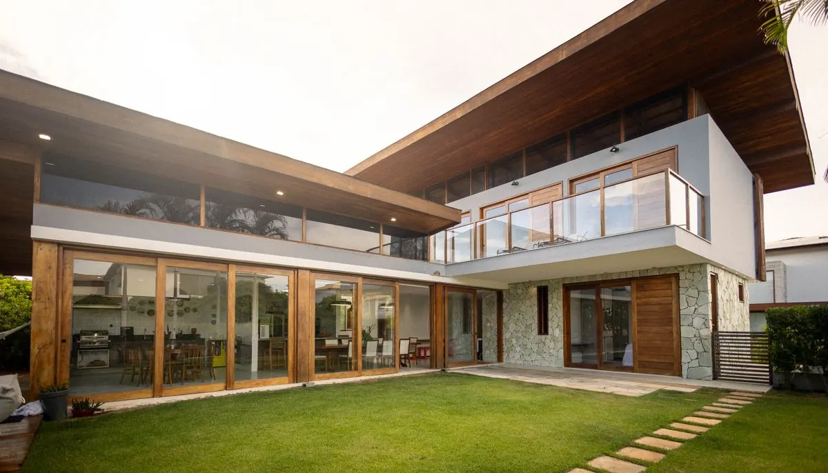 Modern luxury house with glass windows and wooden finish