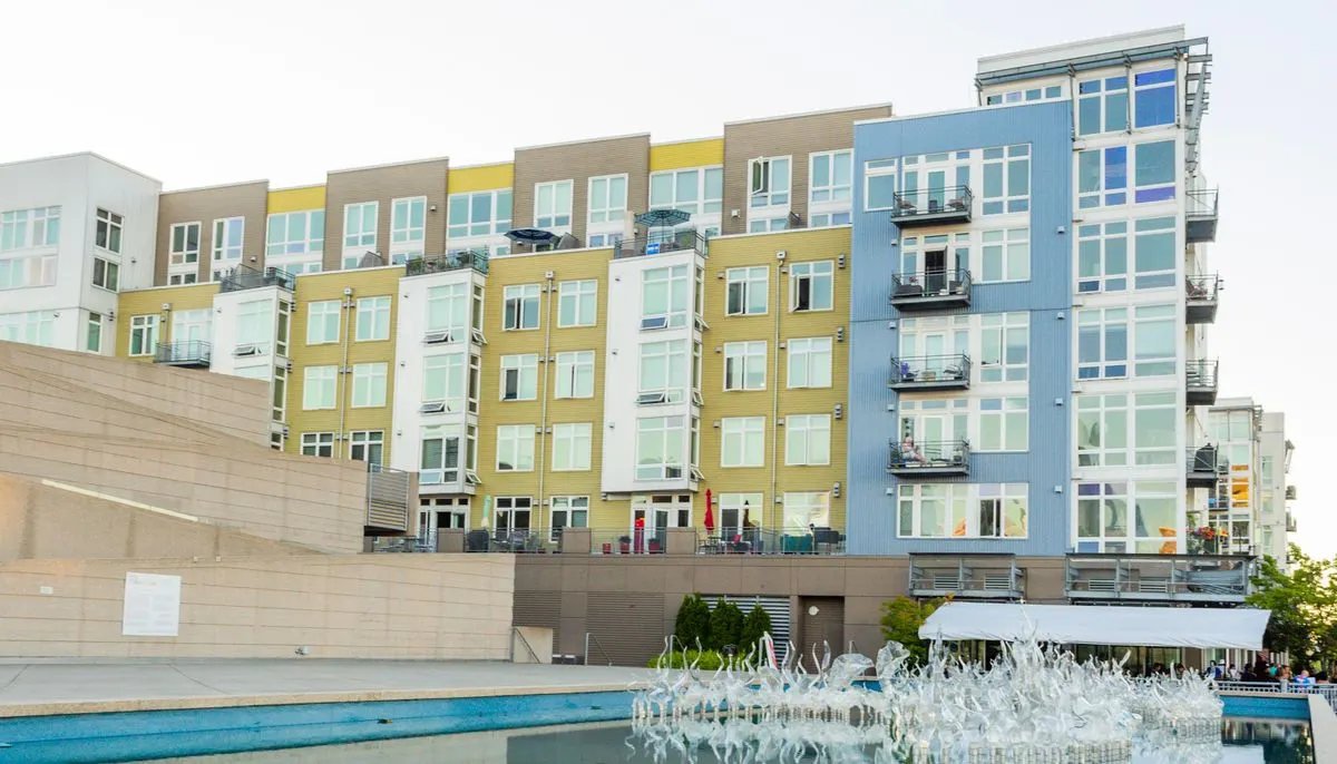White and brown concrete building near the swimming pool