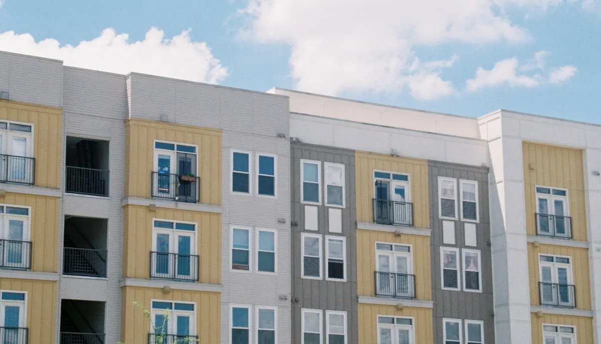 Apartment building against blue sky